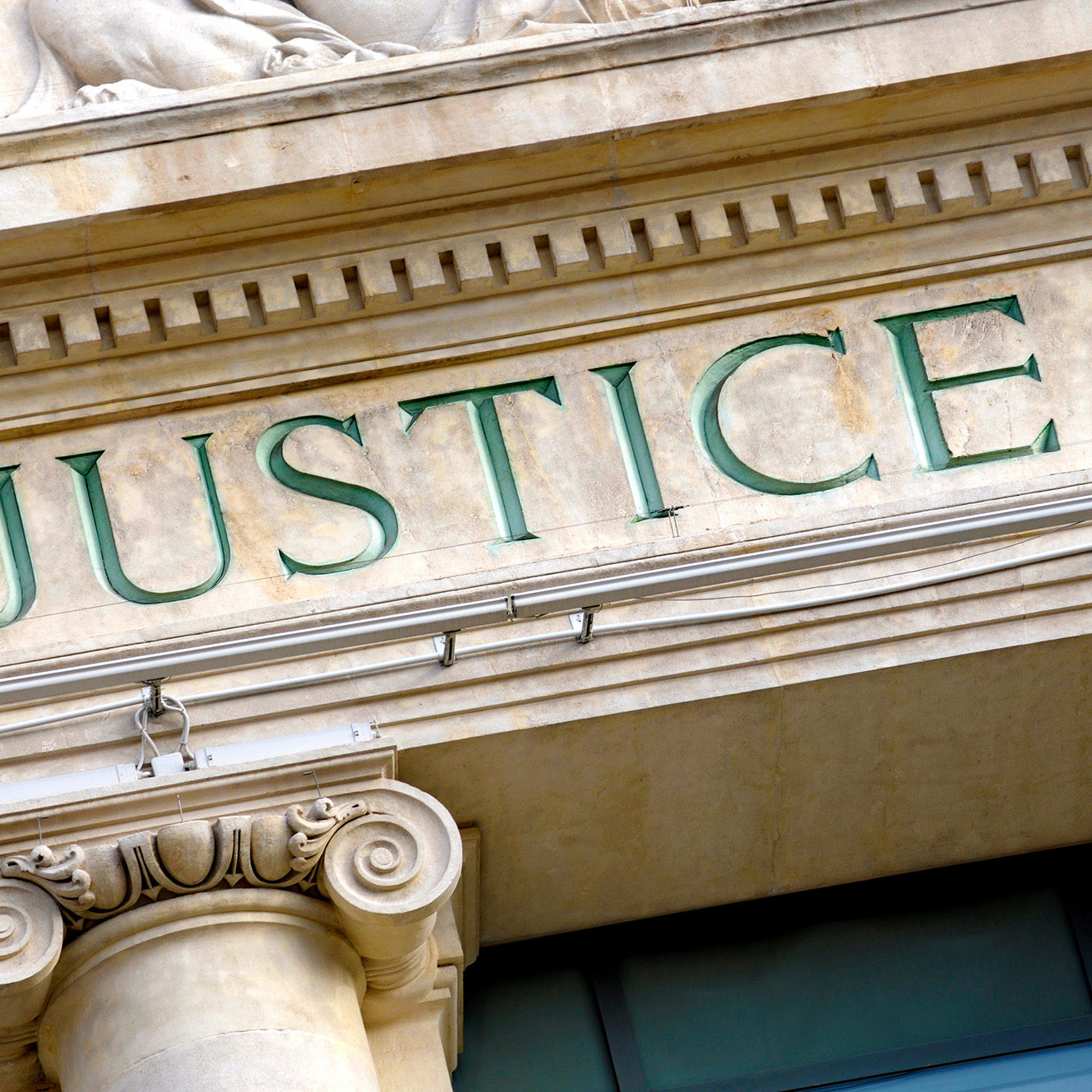 Justice sign on a Law Courts building