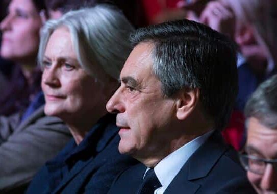 epa05899941 French presidential election candidate for the right-wing party, Les Republicains (LR) Francois Fillon (R) sits beside his wife Penelope (L) as they attend a campaign rally at the Porte de Versailles in Paris, France, 09 April 2017. The French presidential election is scheduled for 23 April and 07 May 2017.  EPA/IAN LANGSDON (MaxPPP TagID: epalivetwo650876.jpg) [Photo via MaxPPP]